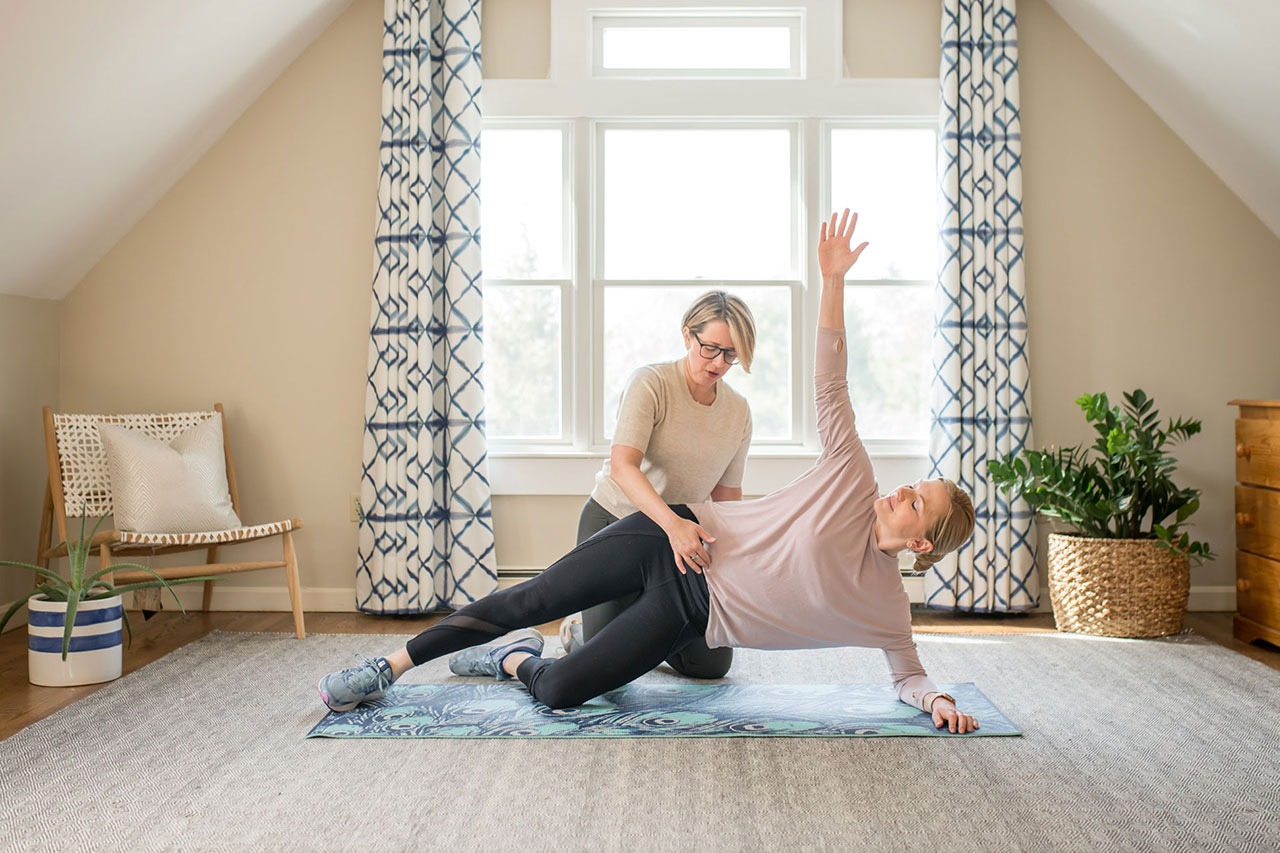 Stretching with Client | Full Circle Wellness | Physical Therapy & Health Coaching | Orthopaedic Injury | Pain Management | Injury Prevention | Sports Medicine | Wellness Assessments | Nutrition & Weight Loss | Newbury, MA